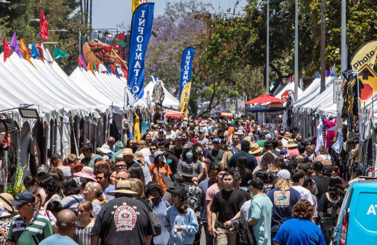 The community gathers during Garden Grove’s annual Strawberry Festival.