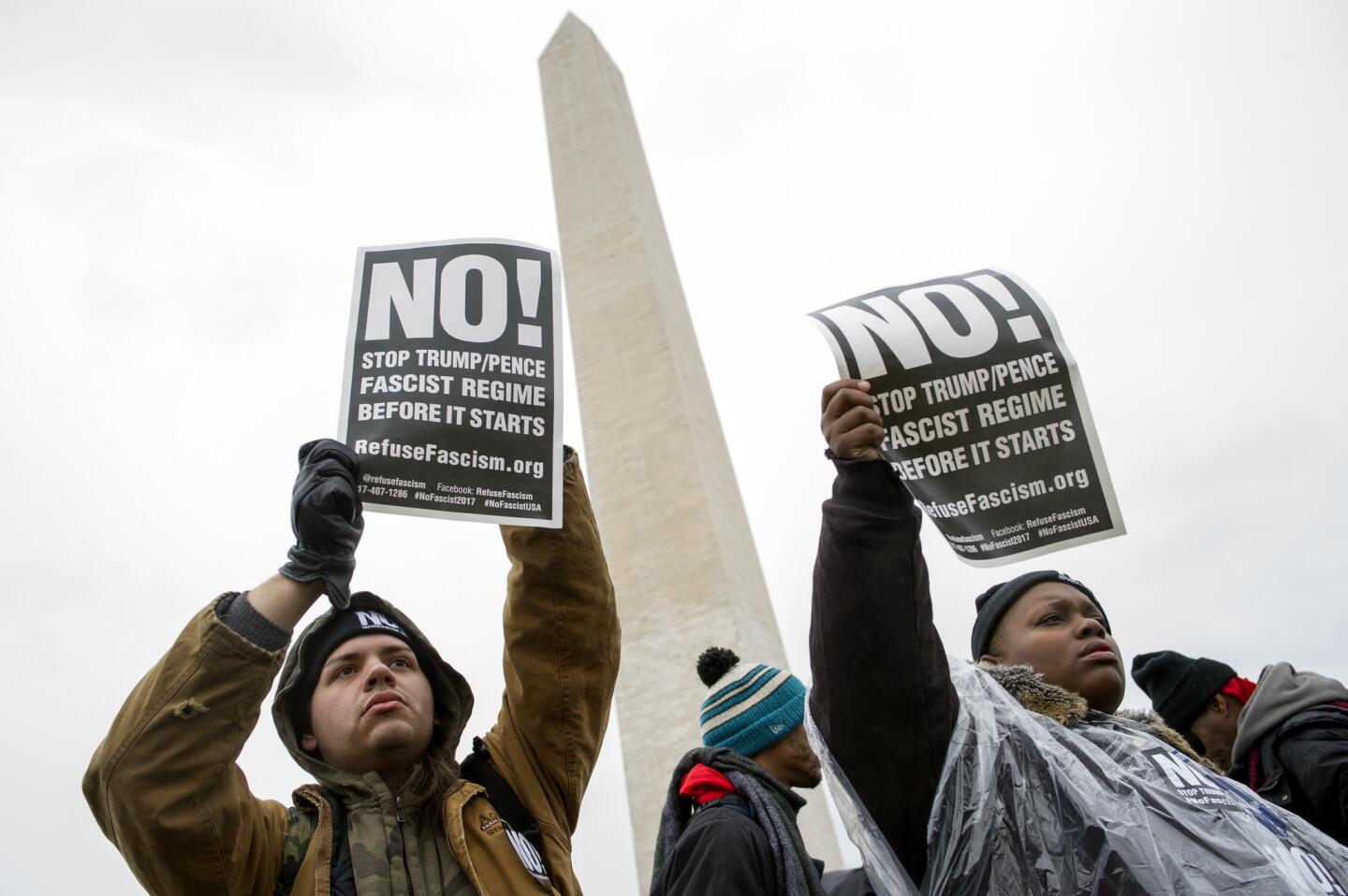 Civil rights advocates demonstrate on the Washington Monument grounds before marching to honor the Rev. Martin Luther King, Jr. in Washingtonon Jan. 14, 2017.