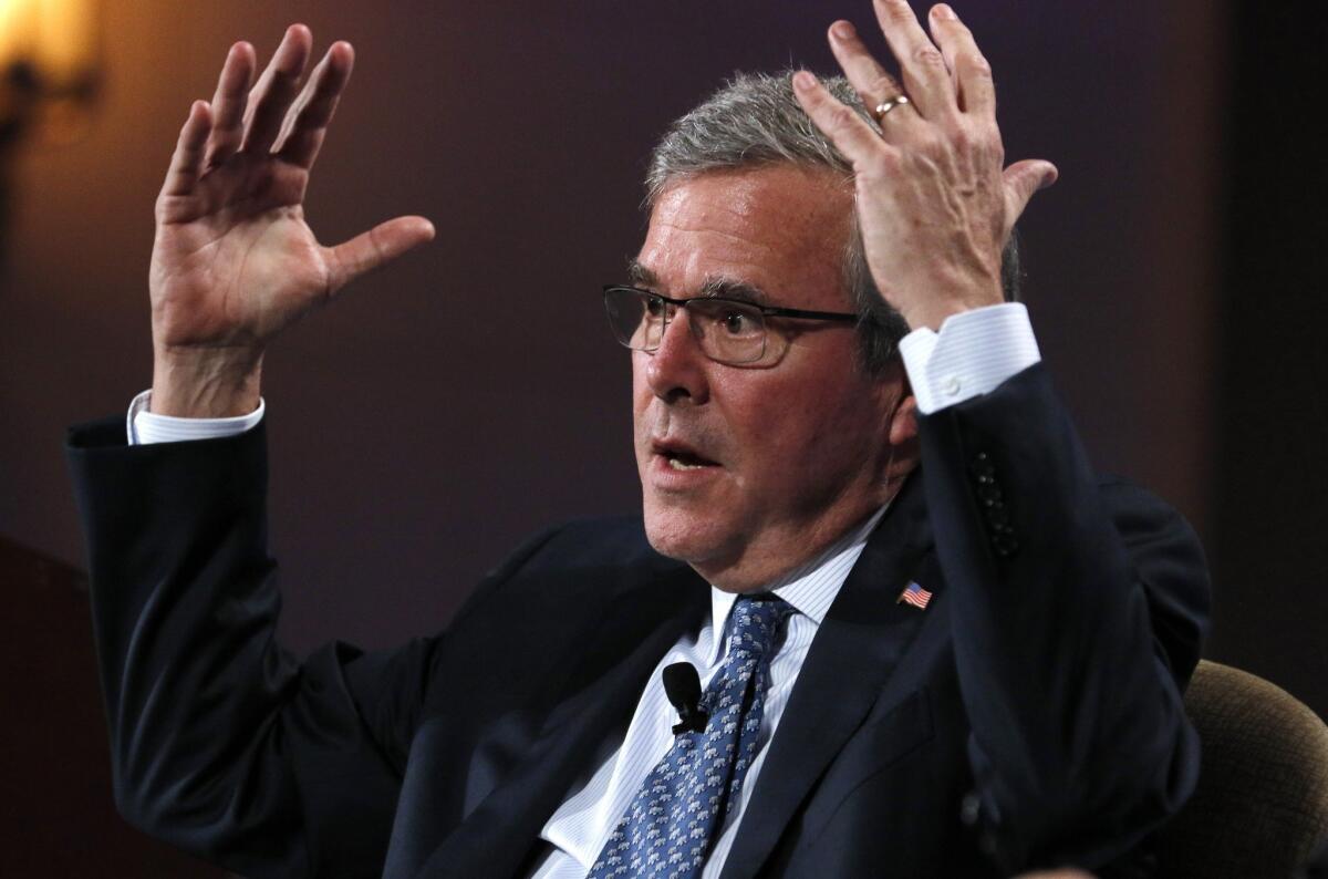 Former Florida Gov. Jeb Bush answers a question earlier this week at the Club for Growth's conference in Palm Beach, Fla. On Friday, he addressed the Conservative Political Action Conference.