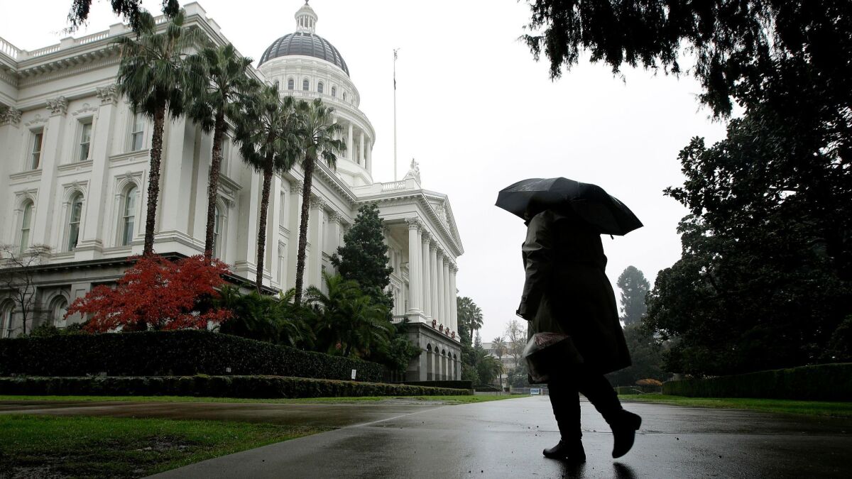 California lawmakers have continued to accept gifts despite previous corruption scandals and subsequent calls for change. Above, a storm passes over the state Capitol in Sacramento.
