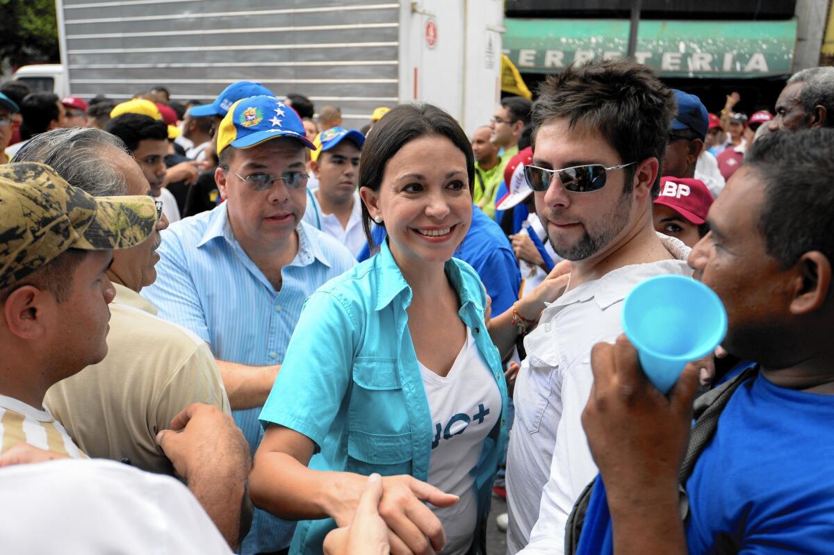 Venezuelan opposition leader Maria Corina Machado has been expelled from the National Assembly and barred from Sunday's election. But she has rallied support for other opposition candidates, who may be primed to win a majority.