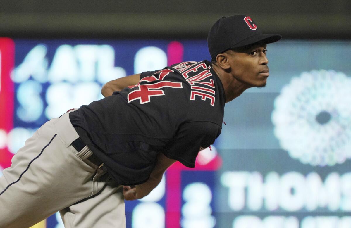Cleveland Guardians pitcher Triston McKenzie watches a fifth inning pitch against the Minnesota Twins in the sixth inning of a baseball game, Saturday, Sept 10, 2022, in Minneapolis. (AP Photo/Jim Mone)