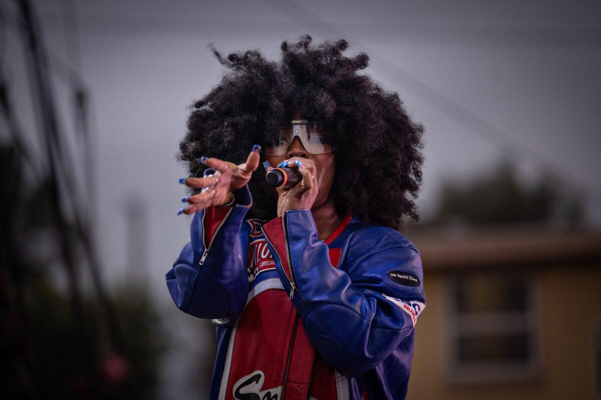 SZA performs at Top Dawg Entertainment's  annual toy drive and concert at the Nickerson Gardens housing projects on Tuesday in Los Angeles.