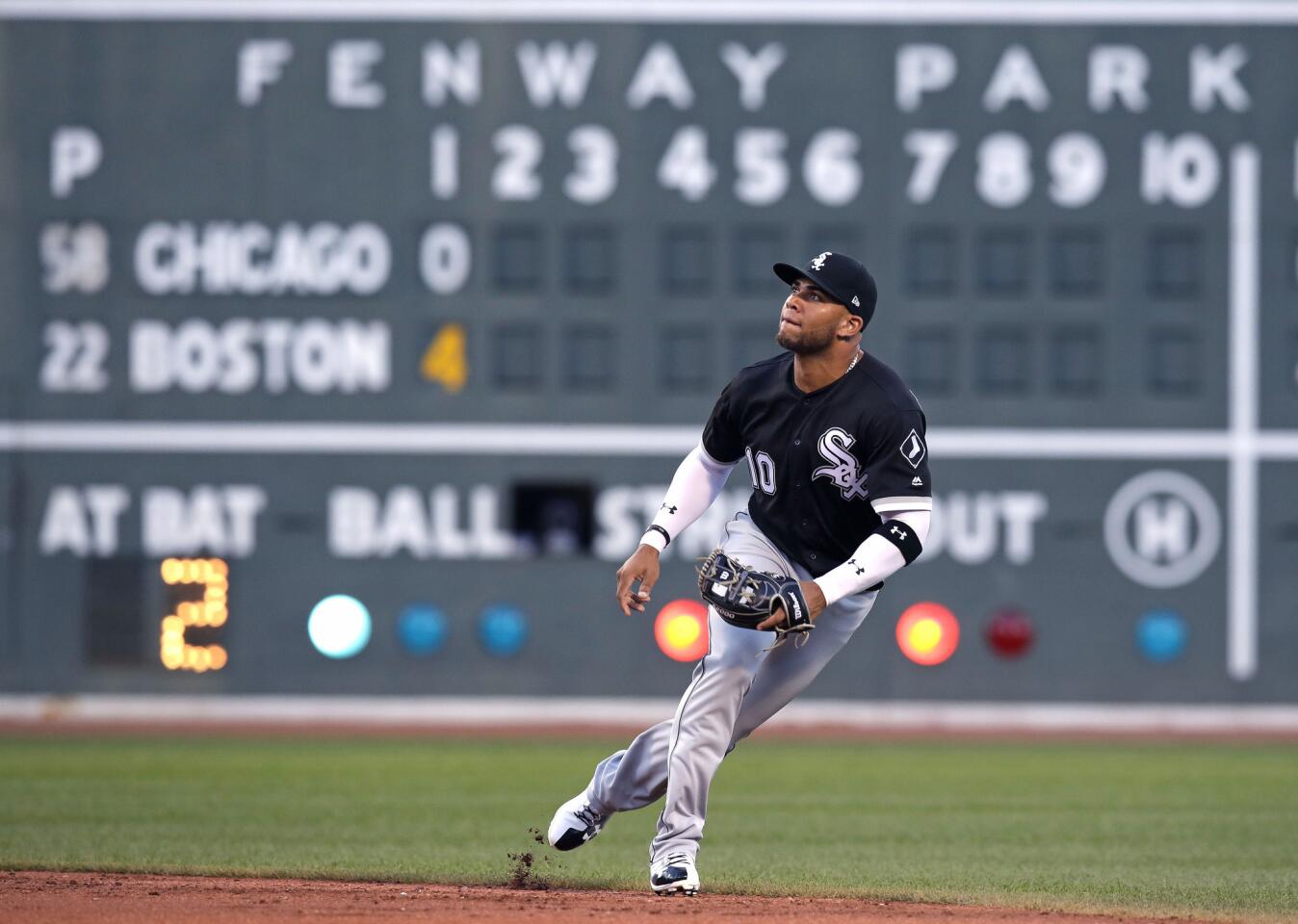 Yoan Moncada, a former Red Sox minor league prospect, tracks the ball on a fly out during the first inning of a game at Fenway Park on Aug. 3, 2017.