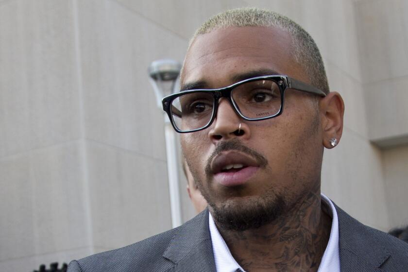 Chris Brown, shown leaving court Sept. 2 in Washington, D.C., said Thursday about the Ray Rice case: "It's all about how you push forward and how you control yourself."