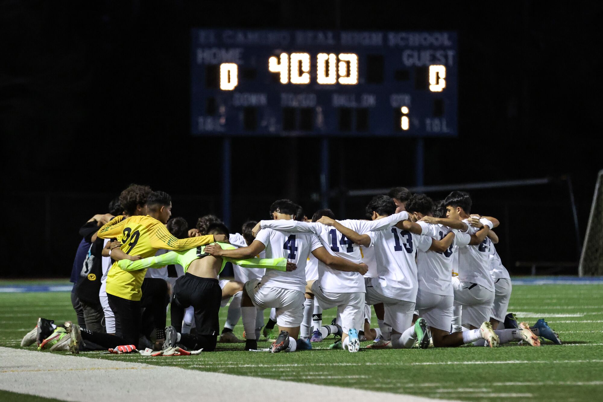 Birmingham's soccer team gathers before its game at El Camino Real on Thursday.