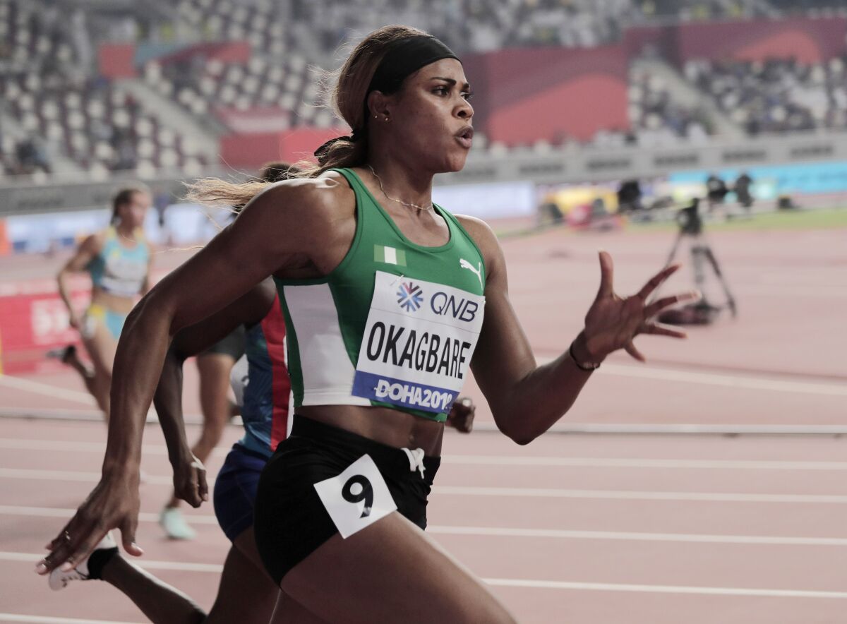 Blessing Okagbare, of Nigeria races in a women's 200 meter heat at the World Athletics Championships in Doha, Qatar, Sept. 30, 2019. U.S. prosecutors charged a Texas man on Wednesday, Jan. 12, 2022 with providing performance-enhancing drugs to athletes competing in the 2020 Olympics in Tokyo, including Okagbare. (AP Photo/Nariman El-Mofty, file)