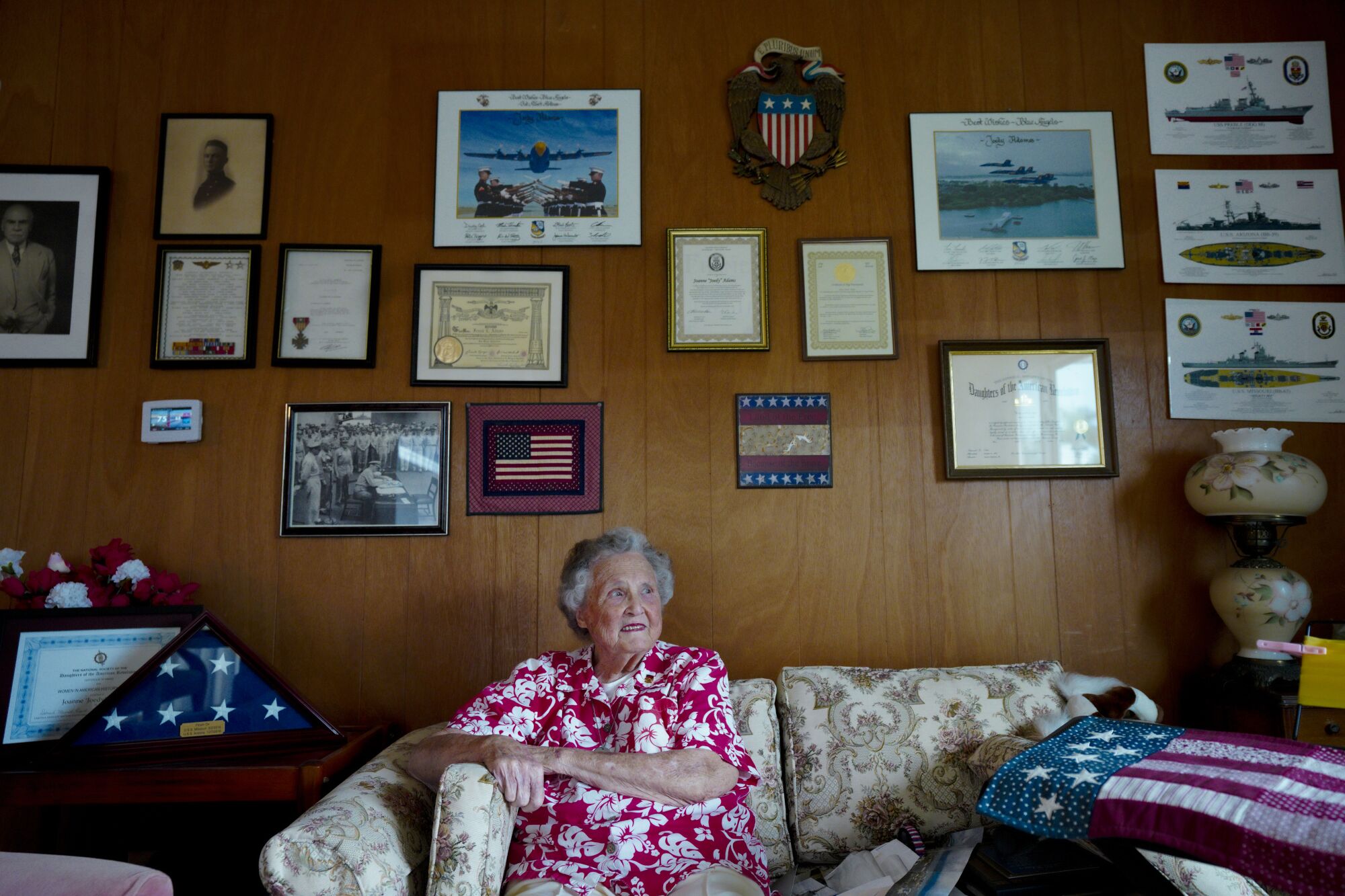 Joedy Cronin Adams, 92, at her home in San Diego, surrounded by Navy memorabilia.