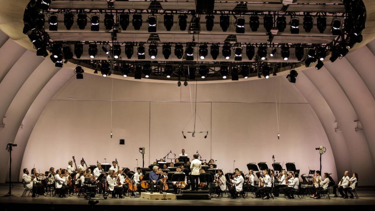 Itzhak Perlman performs with the Los Angeles Philharmonic at the Hollywood Bowl.