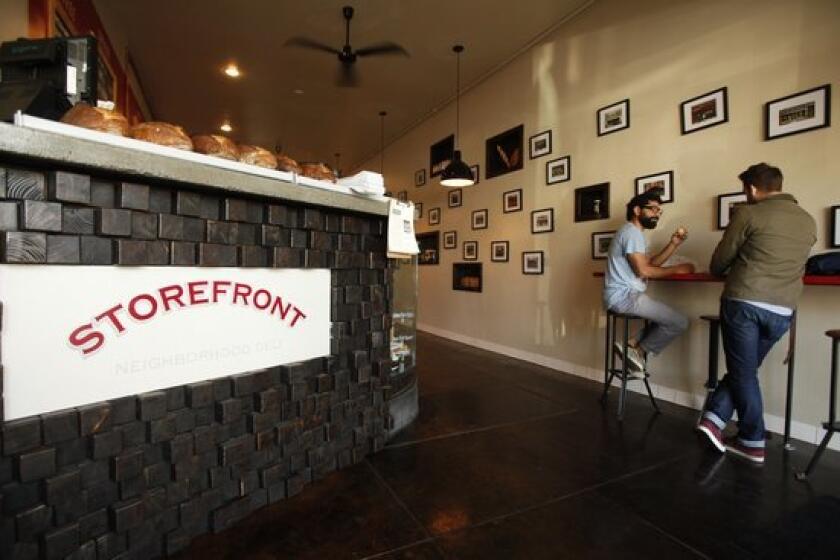 There's not a lot of places to sit at Storefront Deli, and your order at the counter comes in a white paper bag whether it's for dining in or takeout.