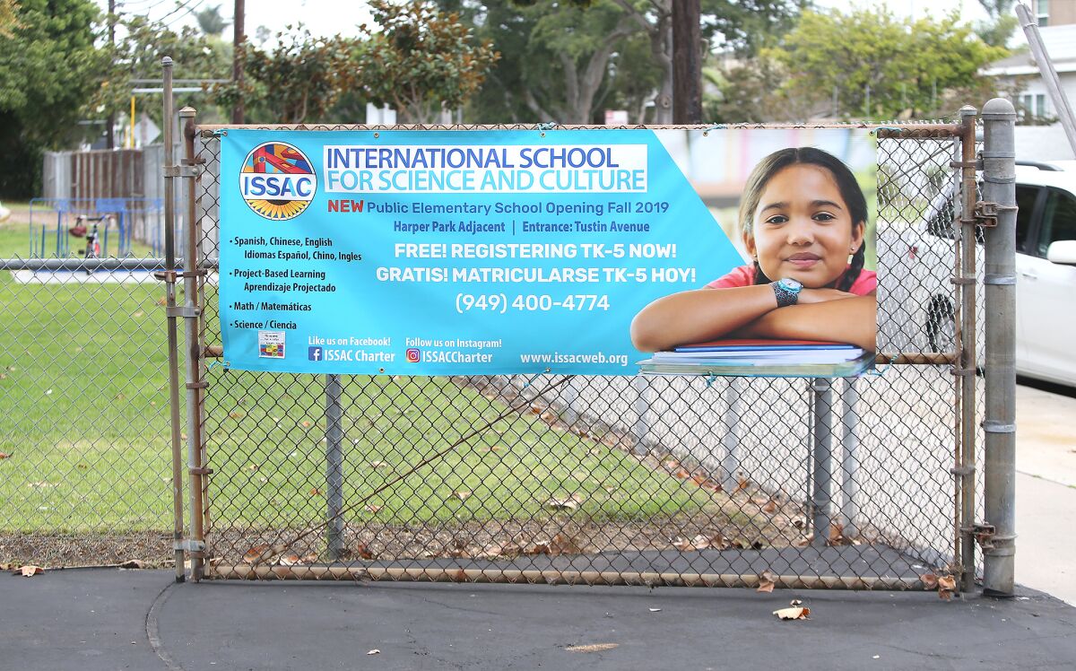 A sign for the International School for Science and Culture, seen in 2019, near the Harper Assessment Center in Costa Mesa.