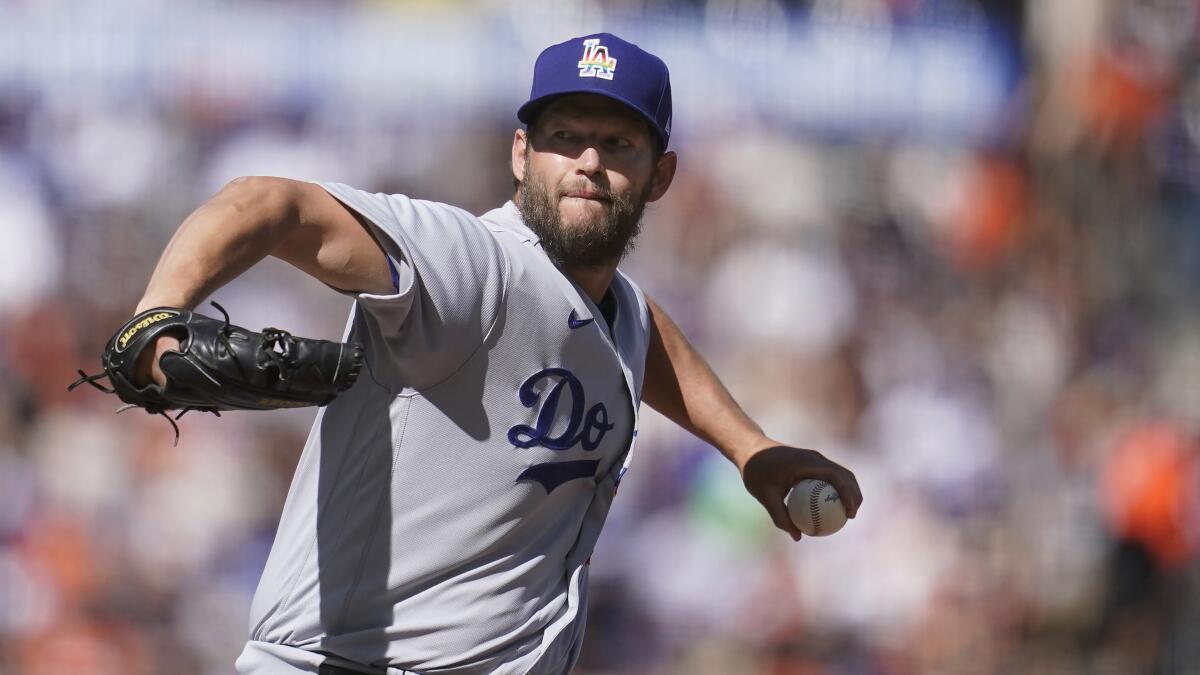 Dodgers starting pitcher Clayton Kershaw delivers against the San Francisco Giants on Saturday.