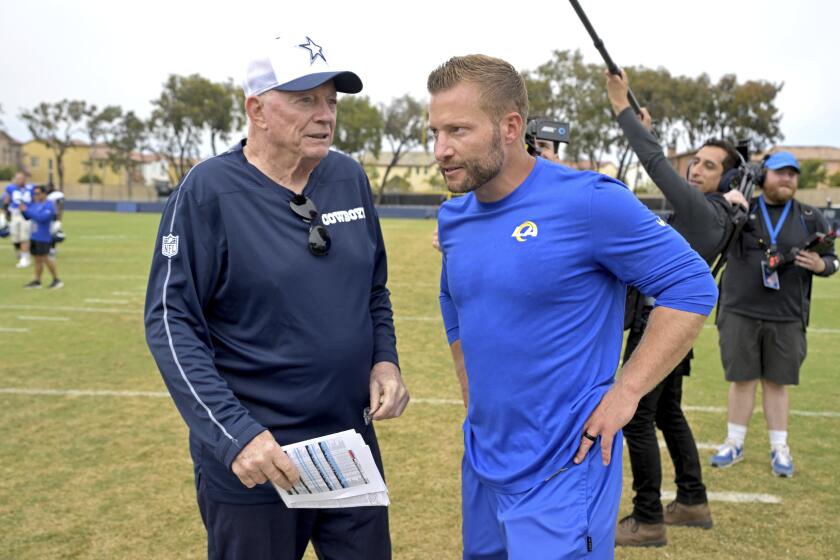 Cowboys owner Jerry Jones (left) talks with Rams head coach Sean McVay  following a joint practice in Oxnard. 