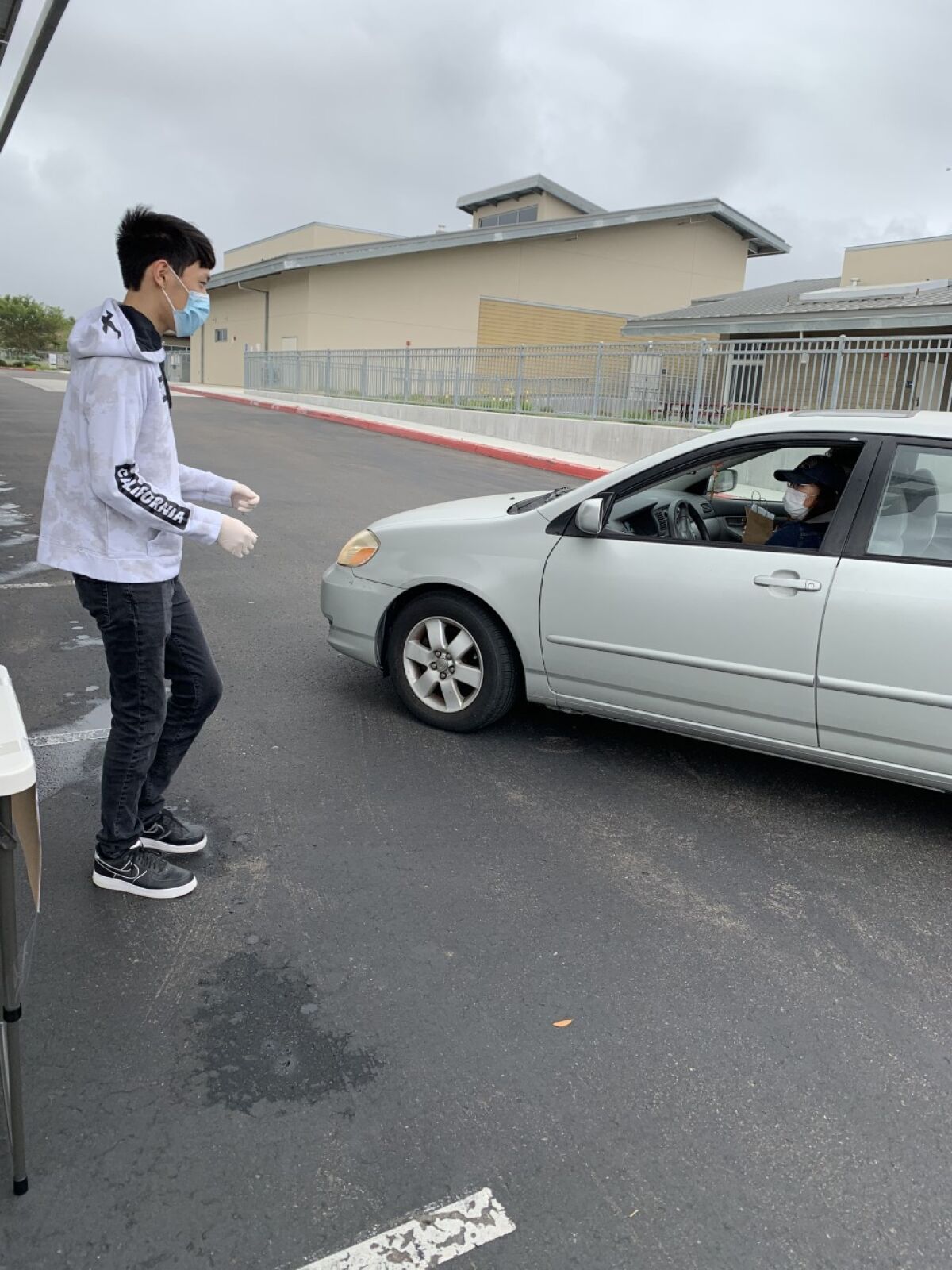 One of the mask giveaway drive-through events held.