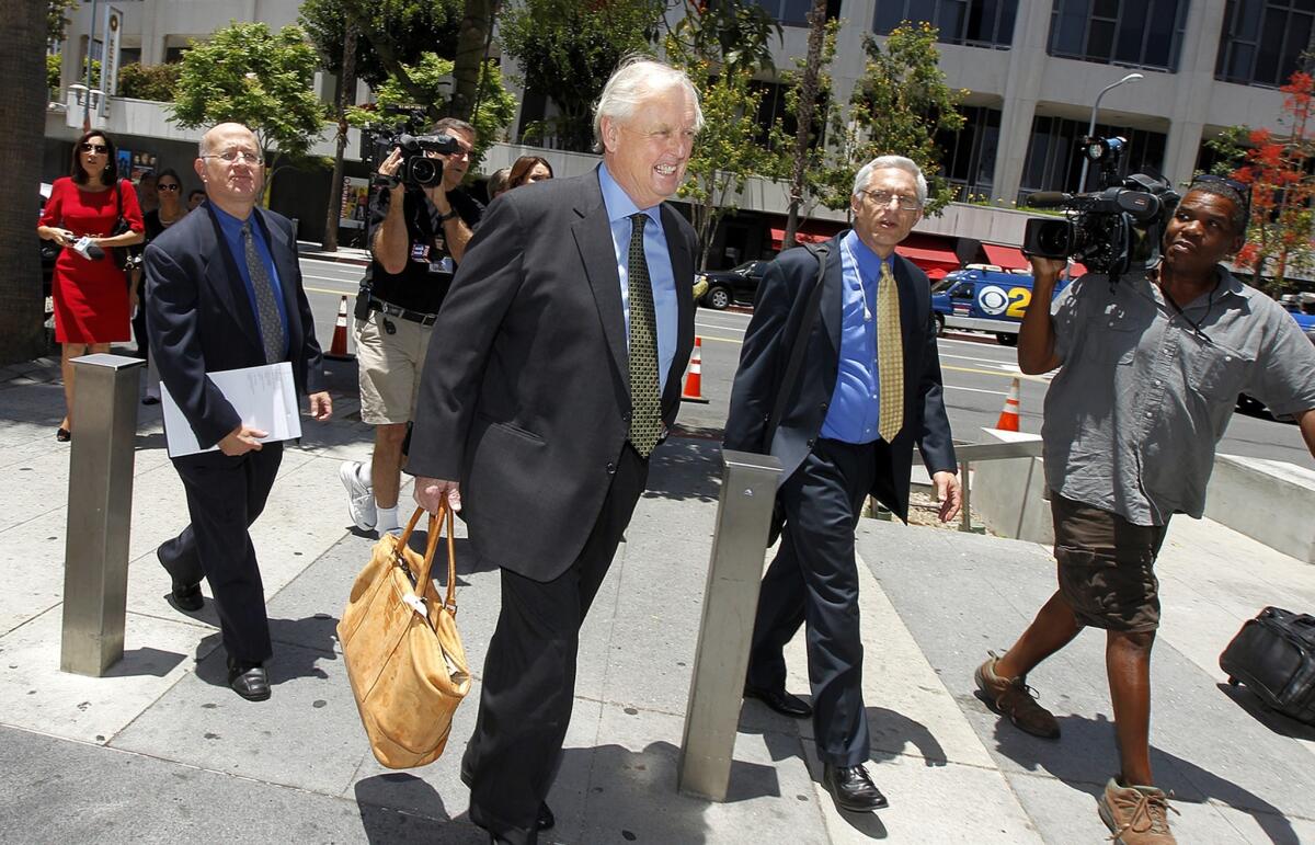 Pierce O'Donnell, center, arrives in June for a pretrial hearing in downtown L.A. in Shelly Sterling's bid to sell the Clippers over the objections of her husband and team co-owner, Donald Sterling.