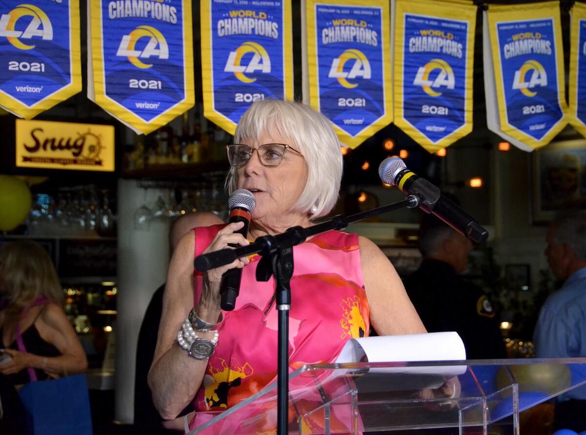 Irrelevant Week CEO Melanie Salata Fitch welcomes guests during the Lowsman Banquet in Newport Beach on Monday.