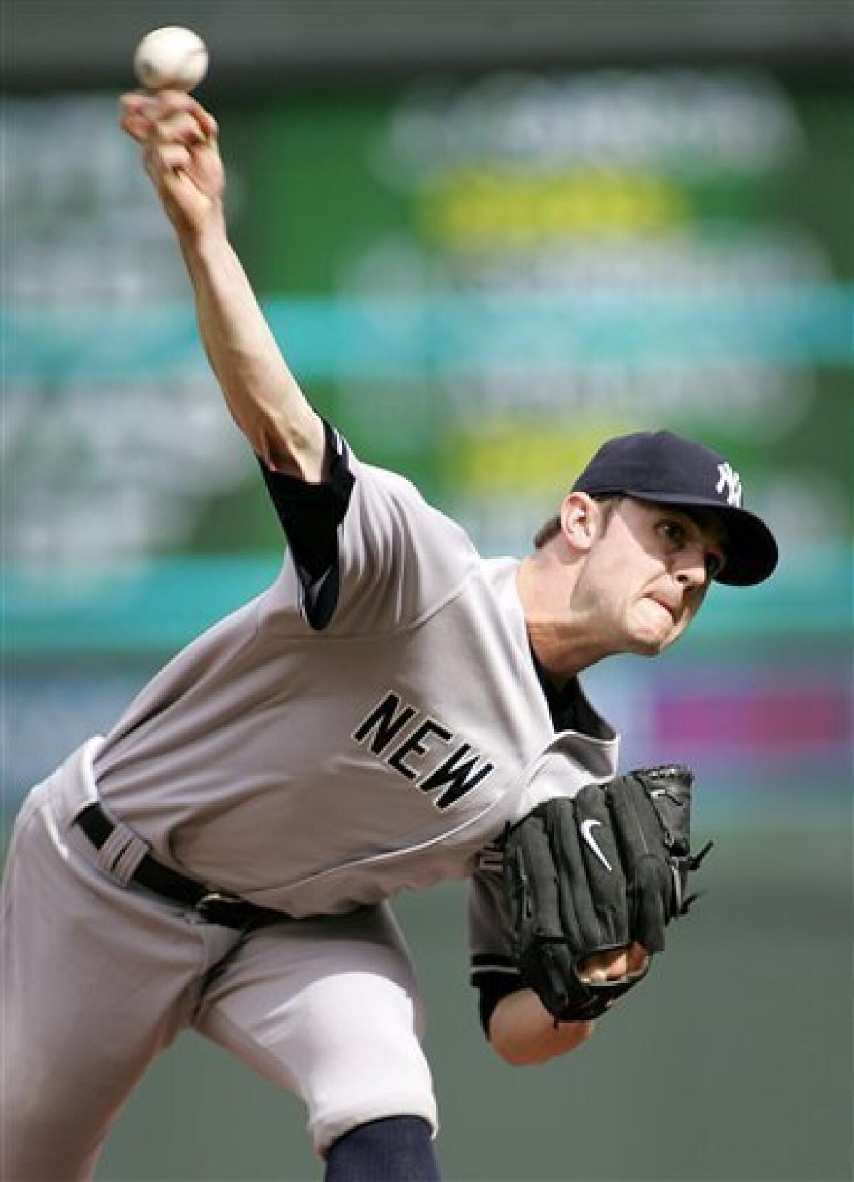 New York Yankees pitcher Joba Chamberlain throws to the Minnesota Twins  during the eighth inning of a rain-suspended baseball game Wednesday, May  26, 2010, in Minneapolis. The Yankees defeated the Twins 1-0. (