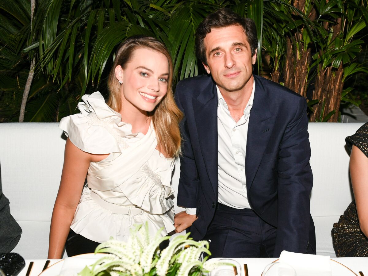 Actress Margot Robbie and perfumer Olivier Polge at the Chanel dinner at the Chateau Marmont in West Hollywood. 