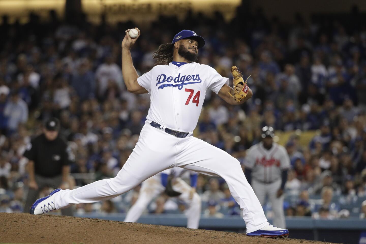 Los Angeles Dodgers' Kenley Jansen throws against the Atlanta Braves during the ninth inning of Game 2 of the National League Division Series Friday, Oct. 5, 2018, in Los Angeles. (AP Photo/Jae C. Hong)
