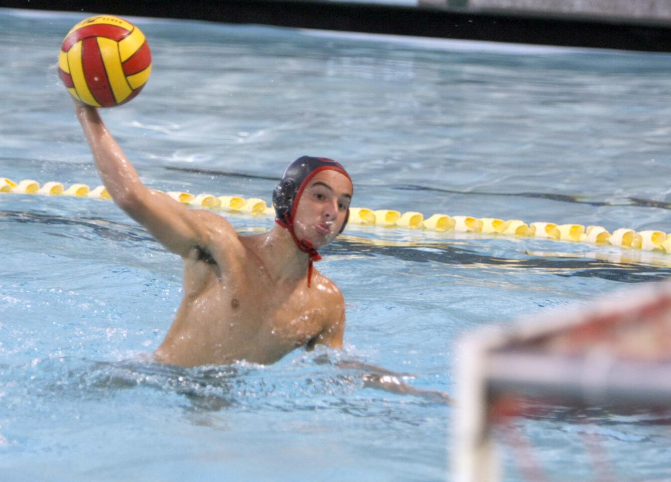 Burroughs High School water player #7 David Arakelyan scores a goal during first-round CIF SS Div. 5 game vs. Whittier High School at home in Burbank on Tuesday, Nov. 8, 2016.