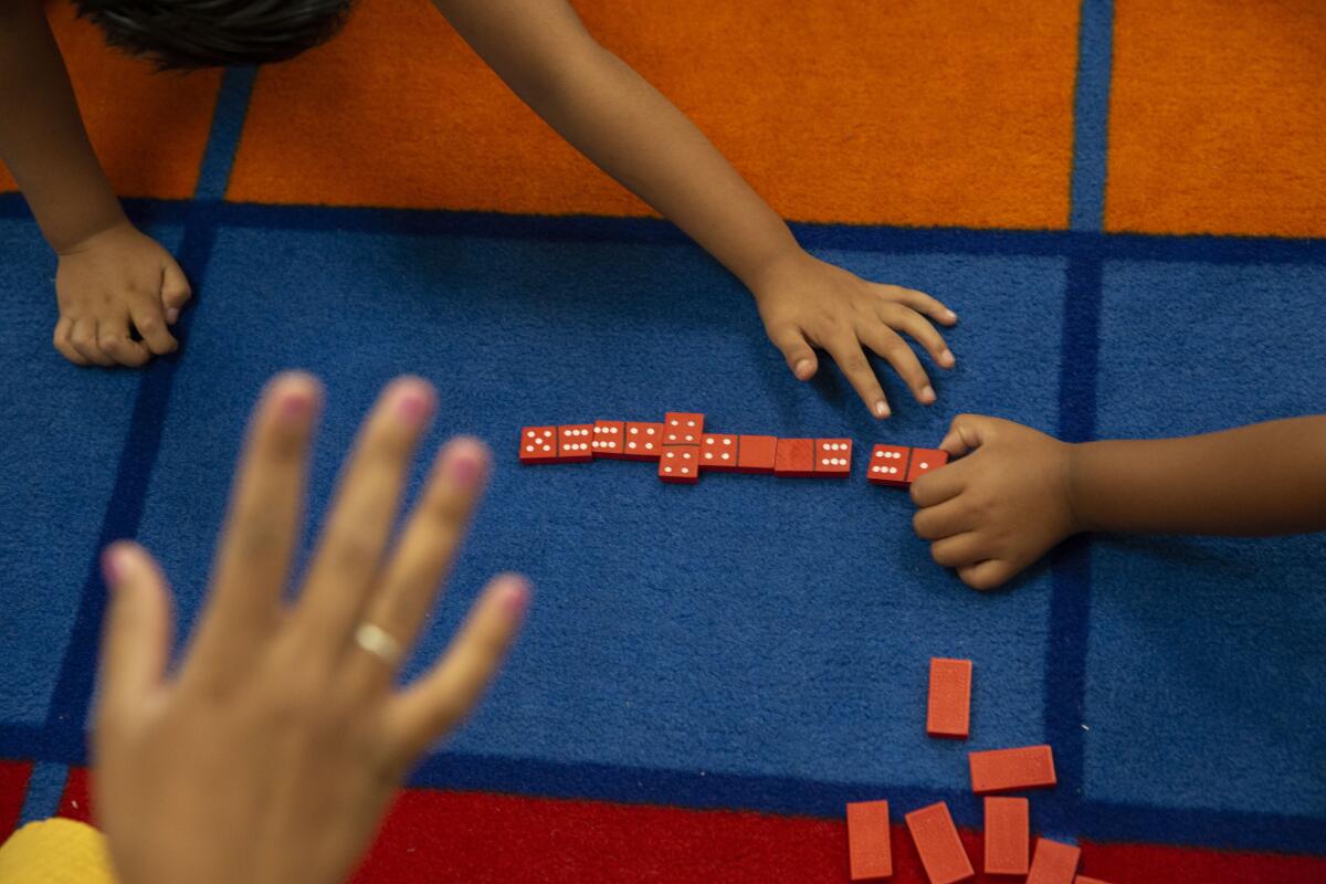 Children playing math games at Esperanza Elementary School in Los Angeles
