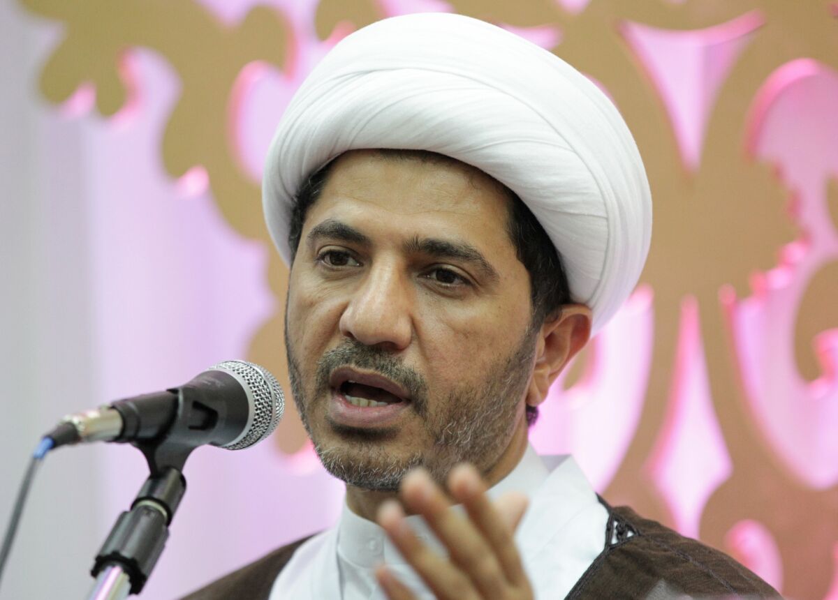 Sheik Ali Salman, head of the Bahraini opposition group Wefaq, takes questions at a gathering for the Islamic holy month of Ramadan in Karzakan, Bahrain, on July 7.