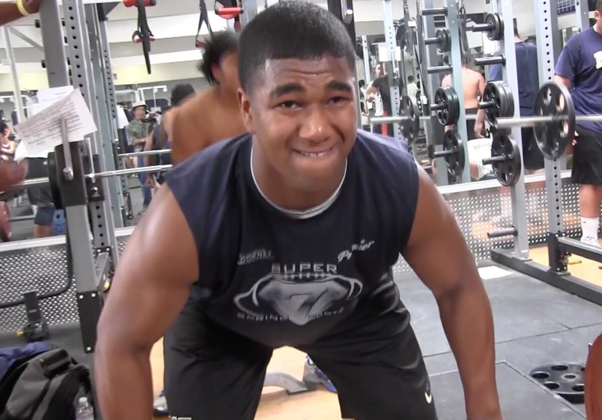 Defensive end Jacob Callier of St. John Bosco is working on his strength in the weight room.