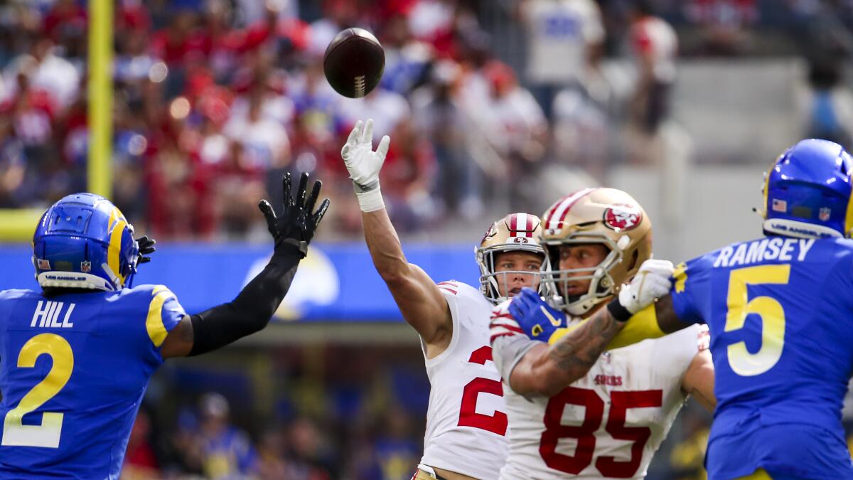 49ers-Rams live updates: McCaffrey passes, catches and runs for TDs