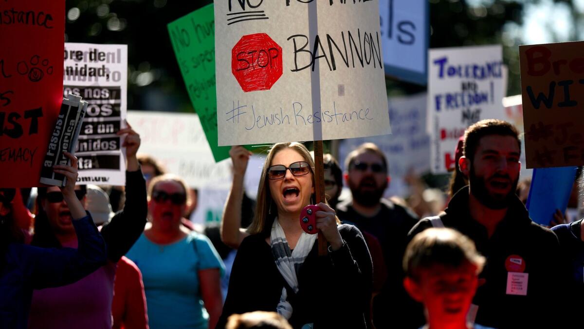 Allison Levine of Los Angeles joins protest marchers near the Breitbart News Network office on Wilshire Boulevard in Beverly Hills on Dec. 4.