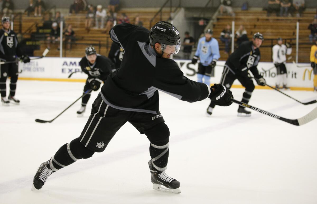 Kings defenseman Slava Voynov has been suspended indefinitely by the NHL after being arrested Monday on suspicion of domestic violence, the league announced.