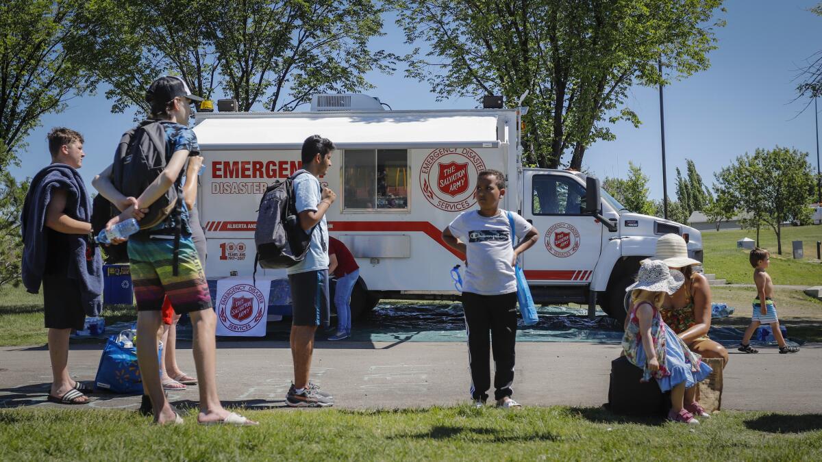 A Salvation Army EMS vehicle sets up as a cooling station in the Canadian city of Calgary.