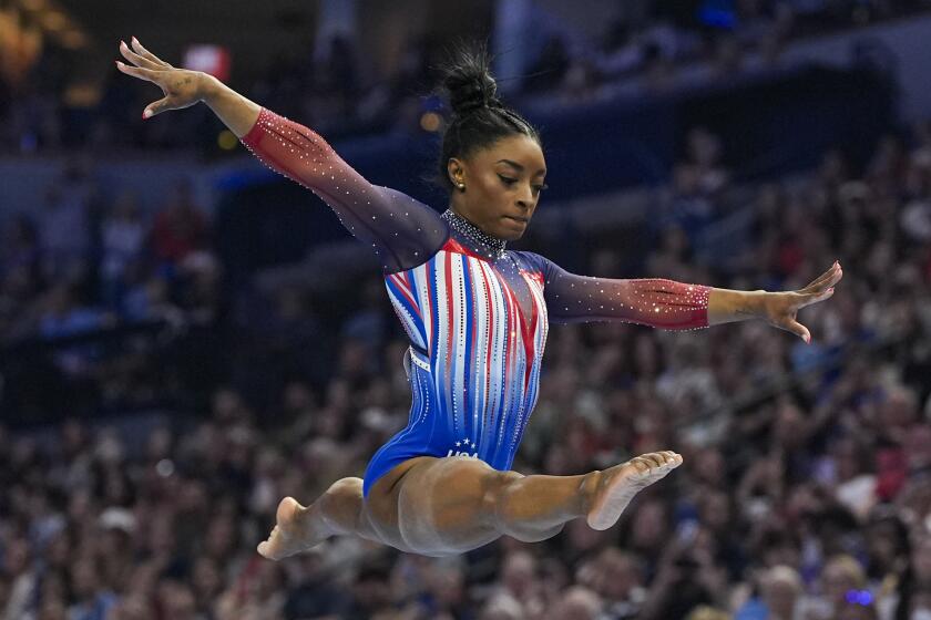 Simone Biles competes on the balance beam at the United States.