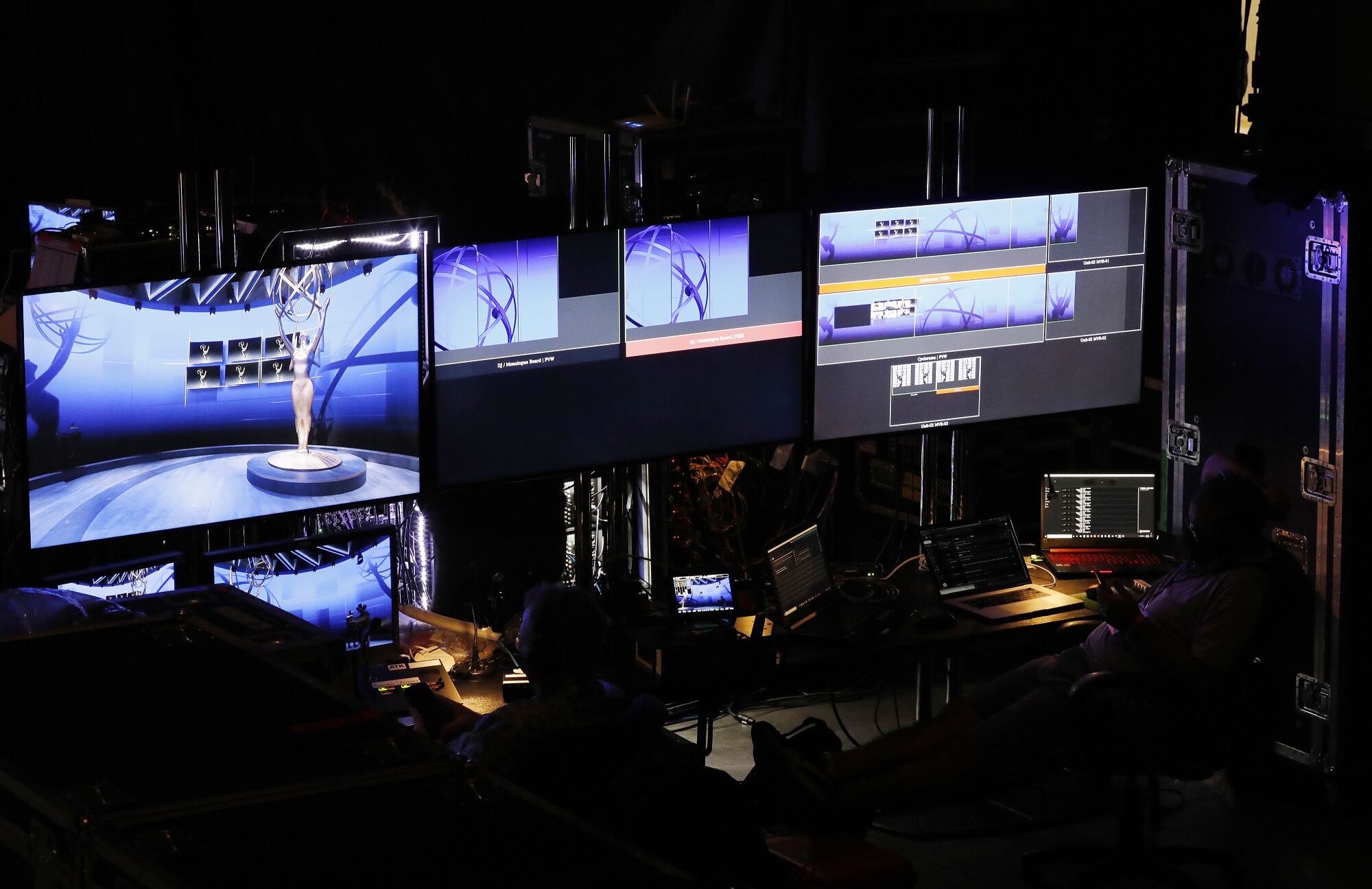 Giant monitors are at the nerve center of production on the floor of Staples Center.