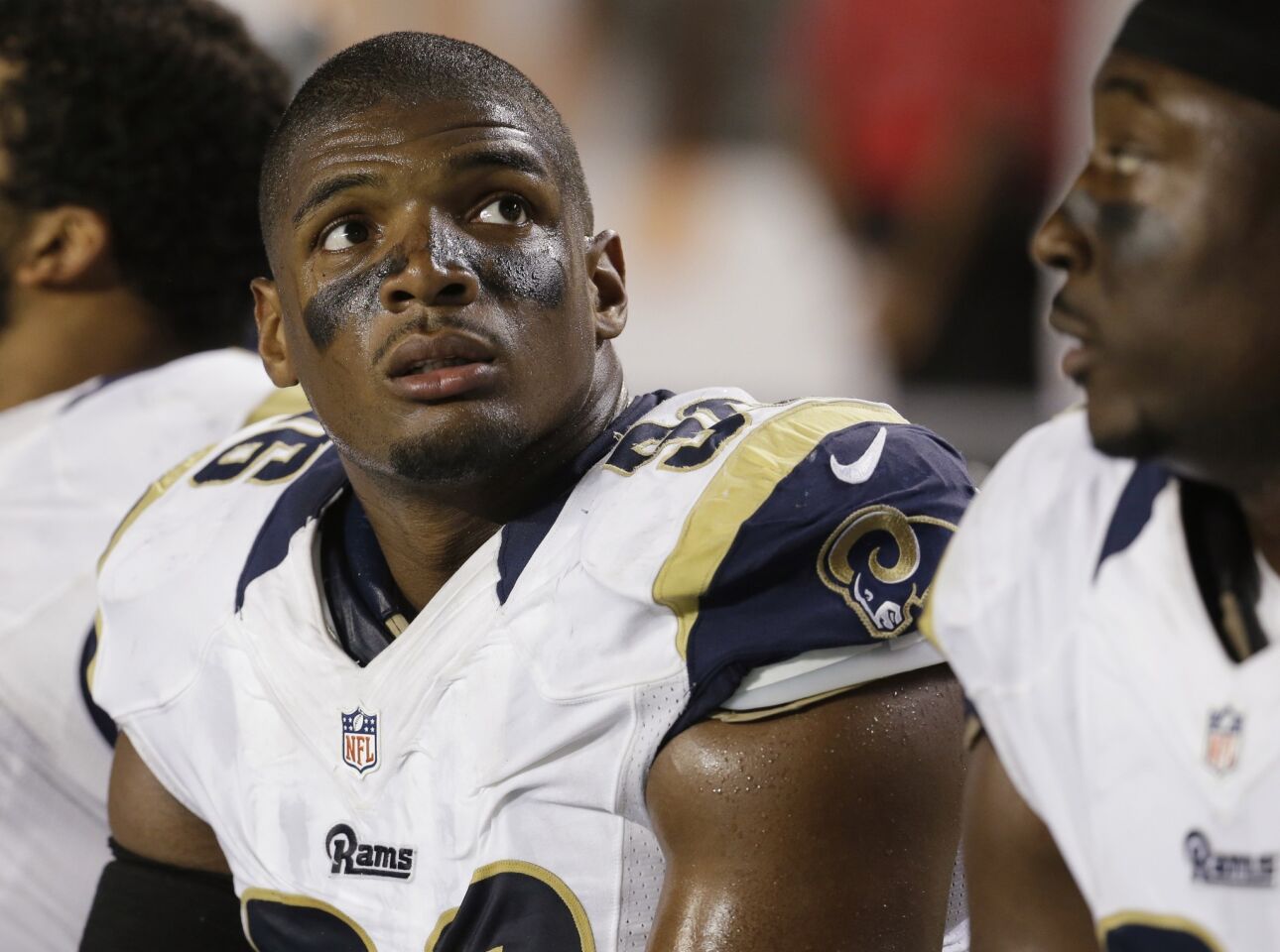 St. Louis Rams defensive end Michael Sam looks on during a preseason game against the Miami Dolphins on Thursday.