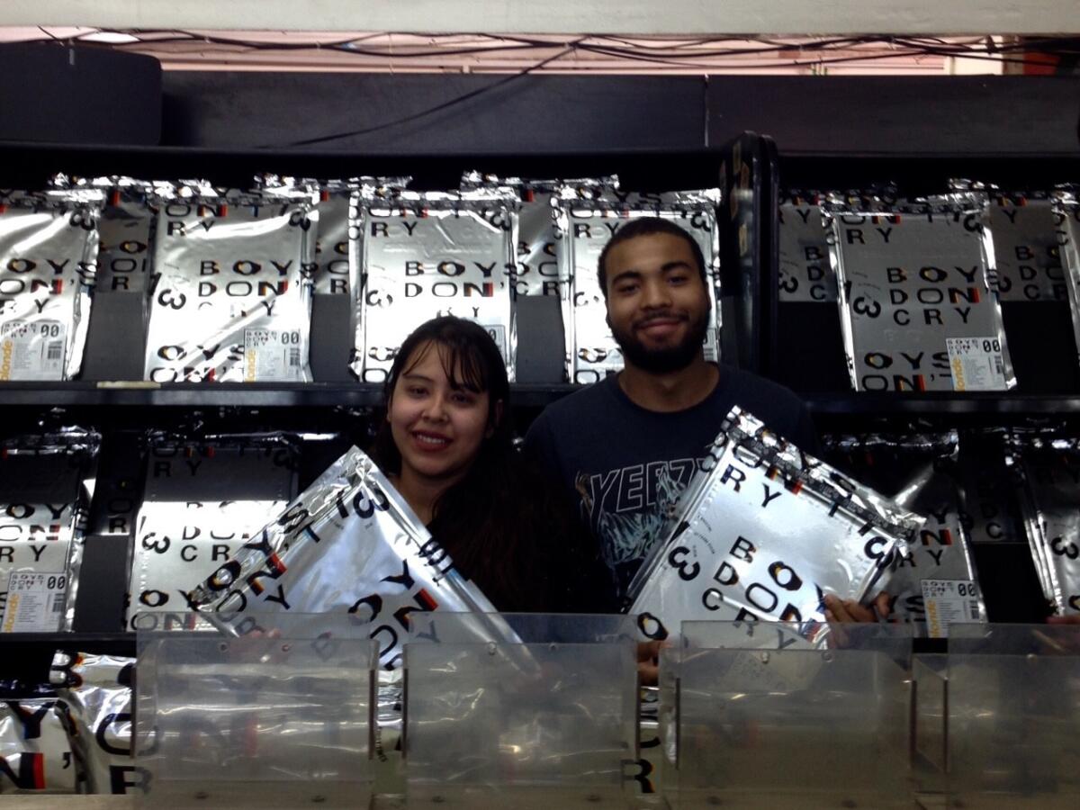 Frank Ocean fans Iri Reza and Cornelius Hall, who scored copies of Frank Ocean's new album and zine at a West Hollywood pop-up shop.