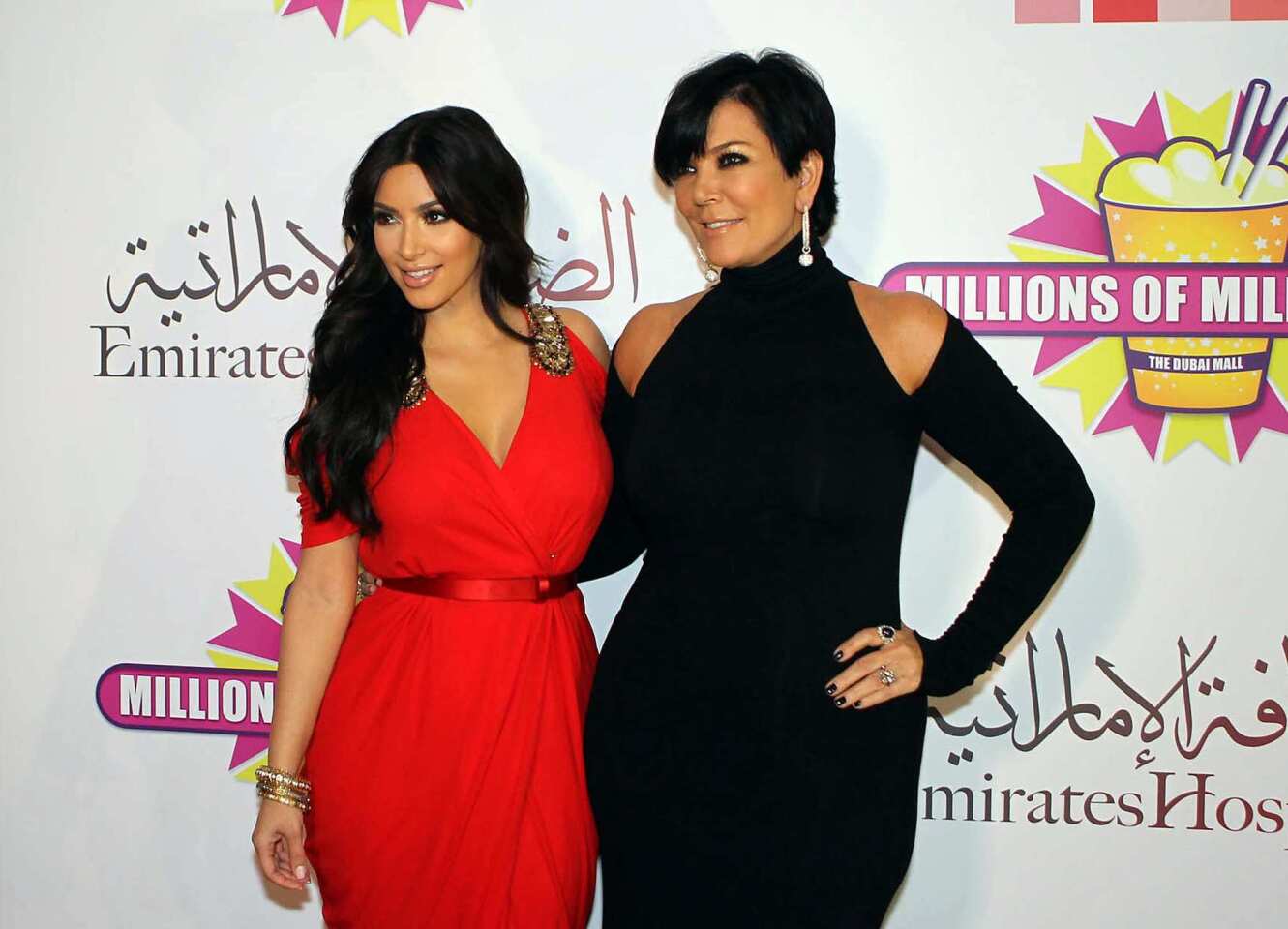 Kim Kardashian, above left, doesn't want her divorce drama turned into reality TV fodder, but "Saturday Night Live" went ahead and did it anyway. The sketch comedy show spoofed the starlet's E! wedding special with a skit called "Kim's Fairytale Divorce," featuring a lavish split scenario in which she signs her divorce papers while handing Kris Humphries a few bucks and some change. Kristen Wiig steals the show as matriarch Kris Jenner, above right, while "It's Always Sunny in Philadelphia" star and host Charlie Day serves as the divorce attorney.