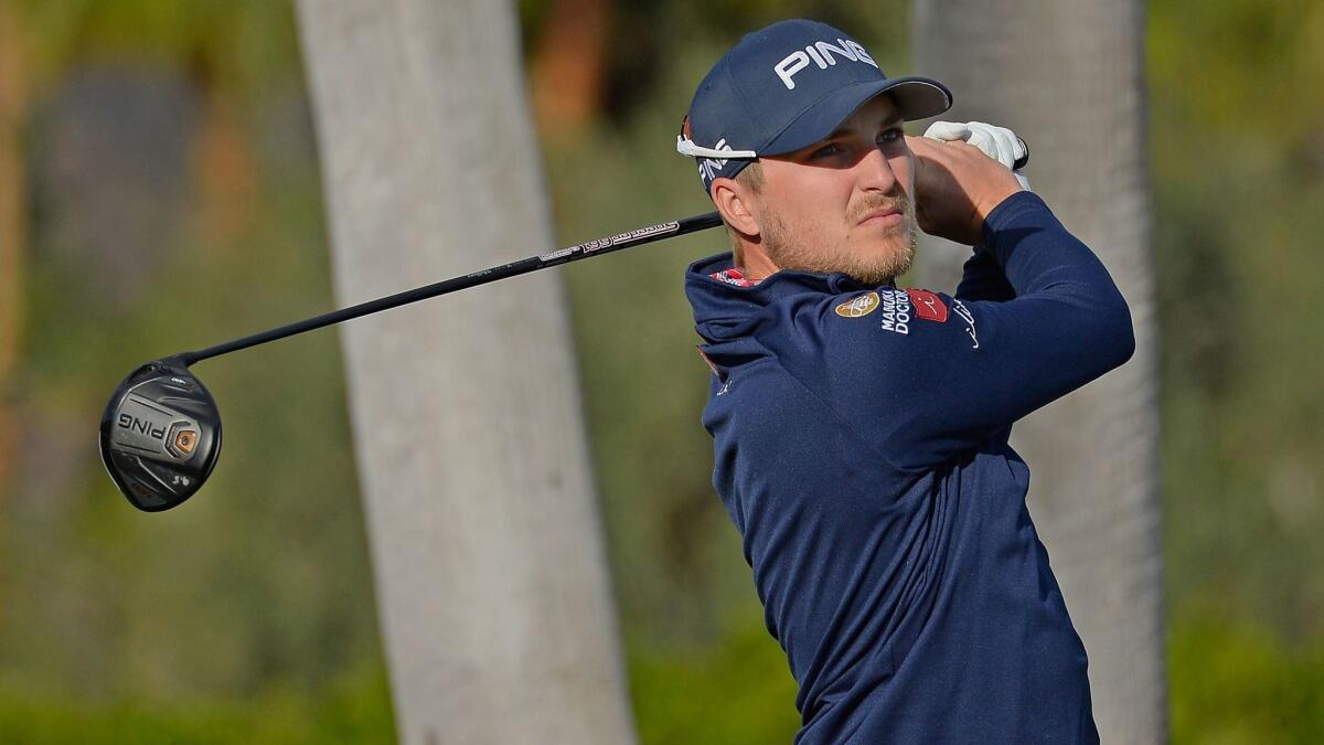 Austin Cook tees off on the first hole during the third round of the CareerBuilder Challenge at La Quinta Country Club on Saturday.