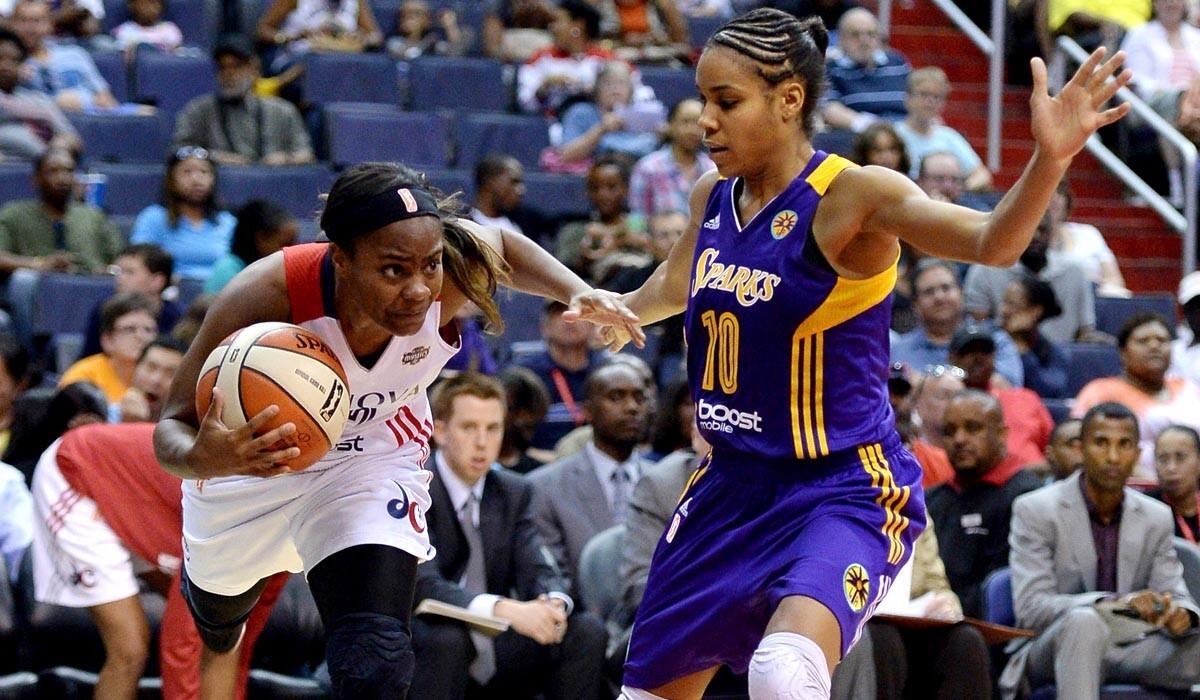 Sparks guard Lindsey Harding cuts off a drive by Mystics guard Ivory Latta during a game last week.
