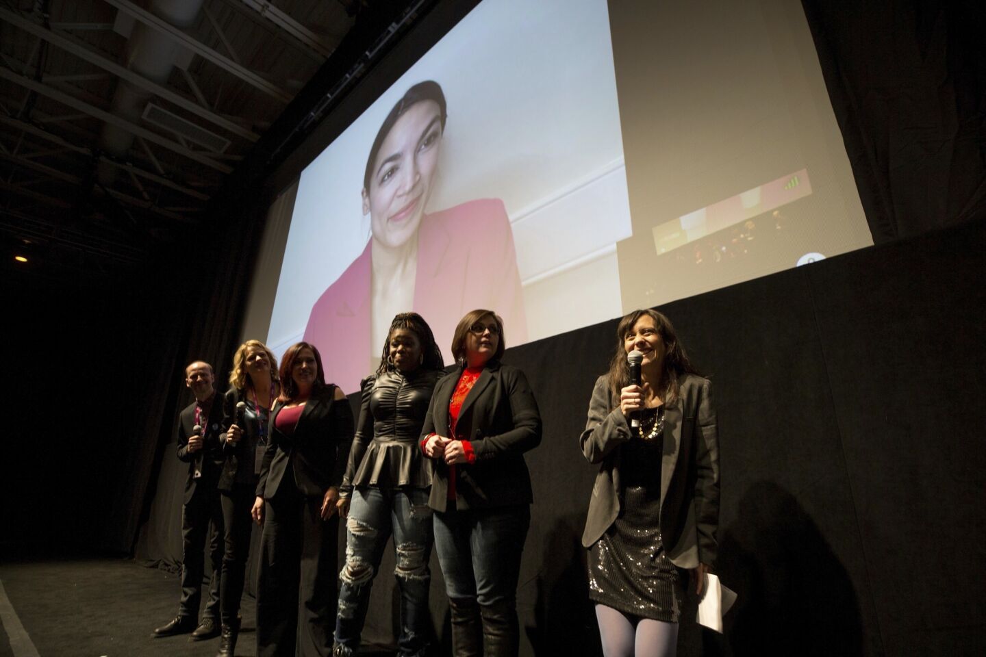 Filmmaker Rachel Lears, right, introduces Rep. Alexandria Ocasio-Cortez (D-N.Y.) via video conference for a Q&A session along with the other subjects of "Knock Down the House." The documentary’s Sundance premiere took place Sunday at the MARC theater, followed by the Q&A.