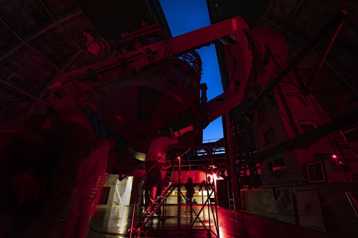 Stargazers get a glimpse of the solar system through the 100-inch telescope at the Mt. Wilson Observatory.