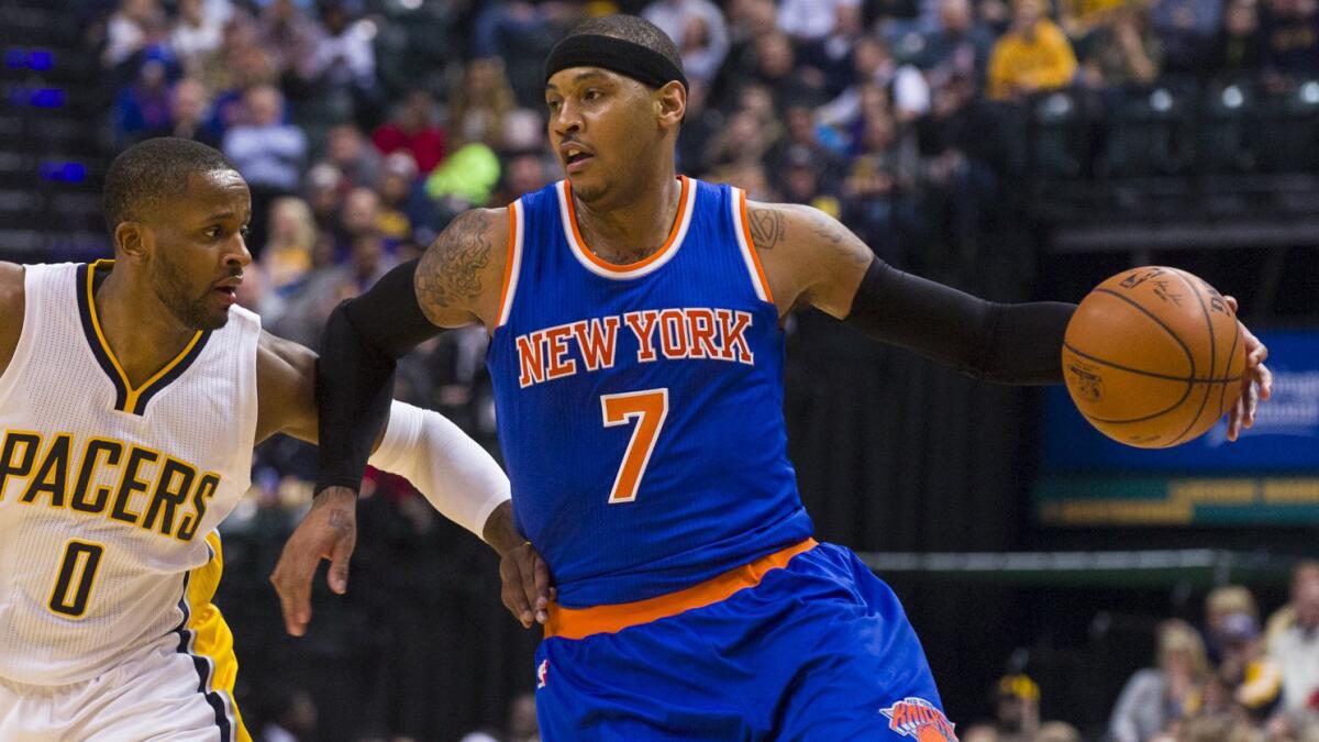 New York Knicks forward Carmelo Anthony tries to drive past Indiana Pacers guard C.J. Miles during the Knicks' loss in Indianapolis on Jan. 29.