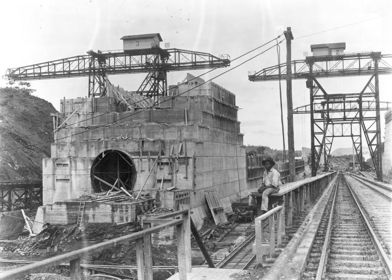 A worker rests in front of the center wall at the Pedro Miguel Locks of the Panama Canal. The canal has three locks: Miraflores and Pedro Miguel on the Pacific side and Gatun on the Atlantic.