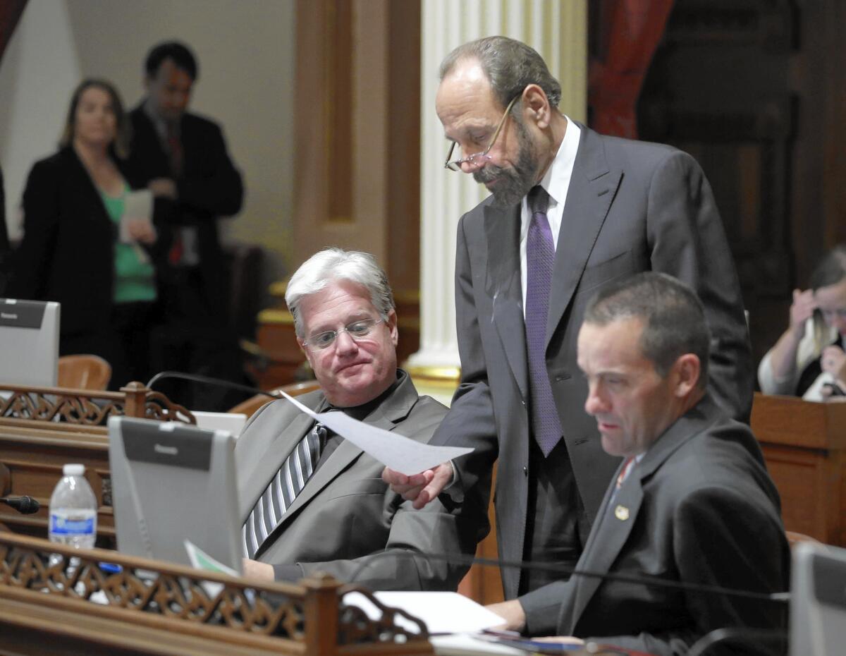 Rep. Steve Knight (shown at right in 2014, when he was in the state Legislature, with State Sens. Andy Vidak, left, and Jerry Hill) has raised $432,640 as of June 30, much more than his three Democratic challengers.