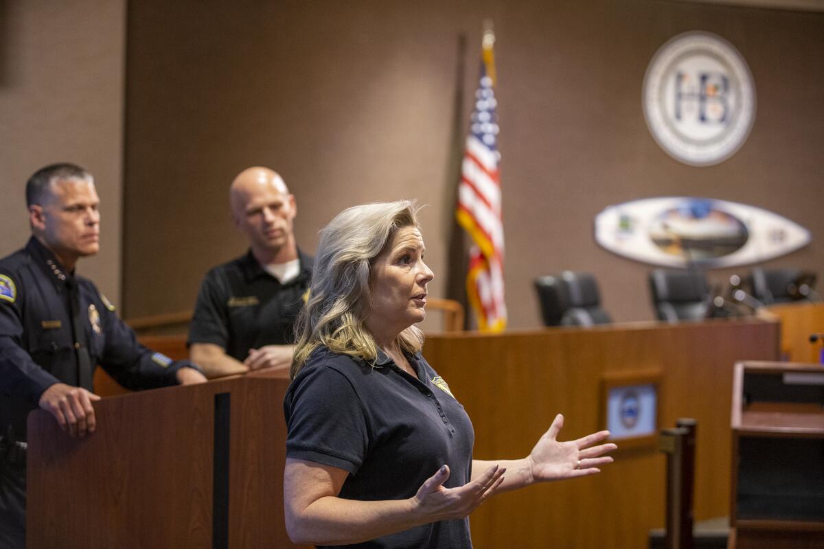 Rebecca Barboza from the California Department of Fish and Wildlife addresses the audience during Monday's town hall meeting.