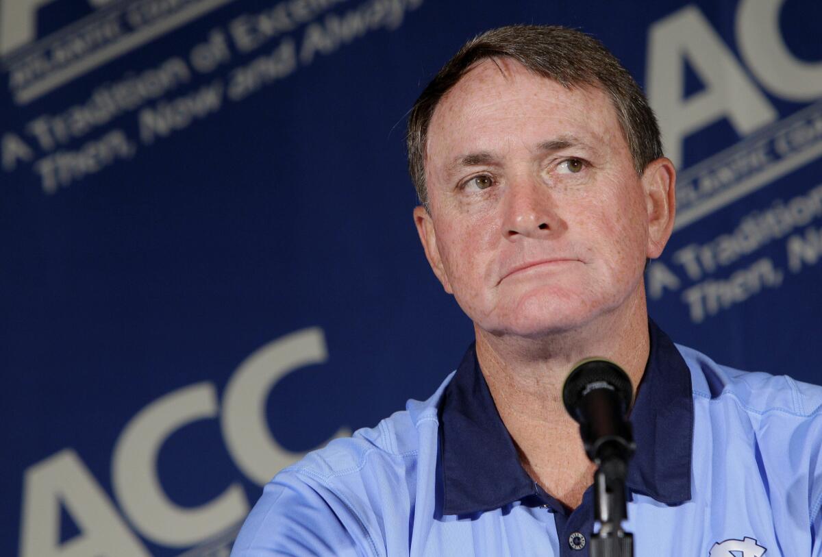 North Carolina Coach Butch Davis pauses during interviews at the Atlantic Coast Conference Football Kickoff in Pinehurst, N.C. on July 25, 2011.