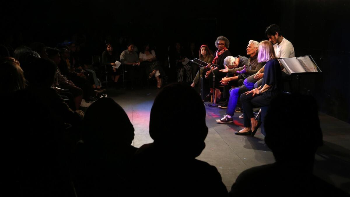 Director of the play, "Time Alone," Sal Lopez, speaks to students from South LA at the Pico Playhouse.