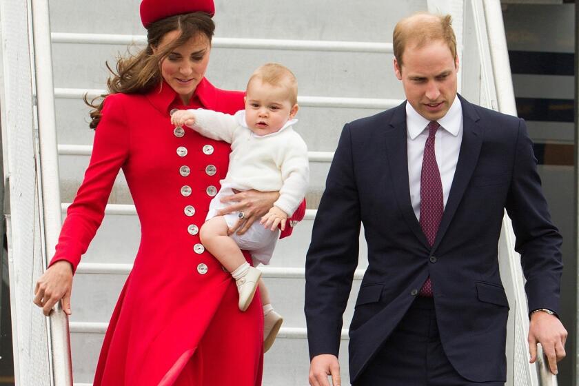Prince William and Catherine arrive in Wellington, New Zealand, with their son Prince George. The family was scheduled to be New Zealand April 7-16. The duchess wears a scarlet Catherine Walker coat and a Gina Foster hat embellished with silver fern-shaped diamond and platinum brooch. The silver fern is New Zealand's emblem.
