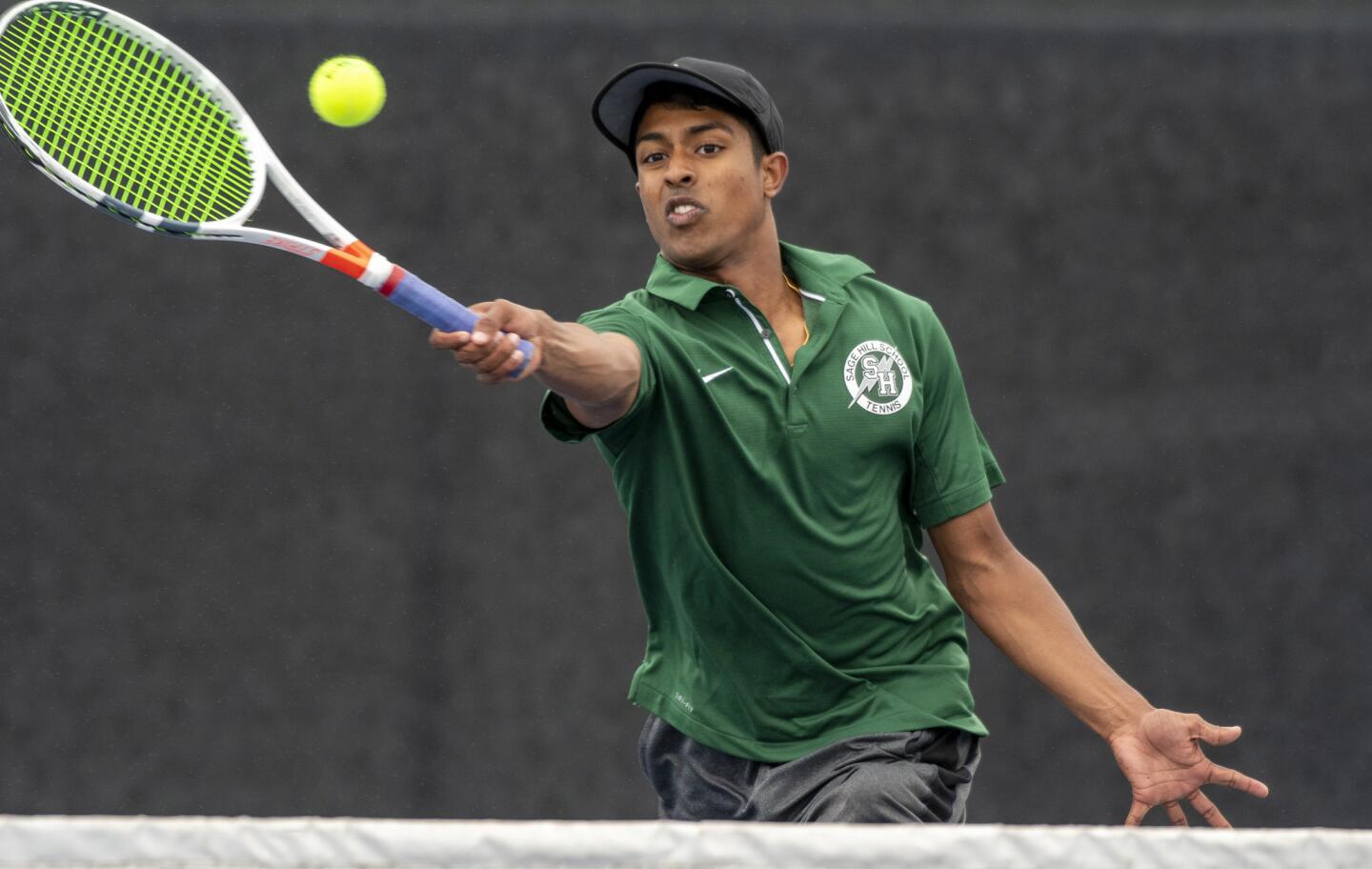 Sage Hill's Rohun Krishnan returns a forehand against Corona del Mar's Will Pellegrini during second round CIF Southern Section Division 1 playoff game on. Friday, May 11.