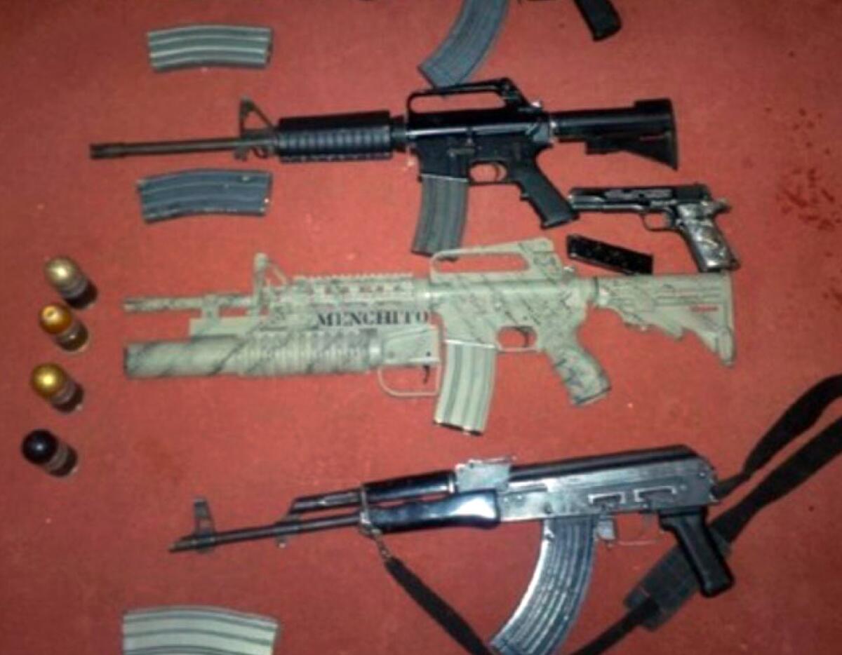 An evidence photo from the trial of Ruben Oseguera Gonzalez shows a rifle equipped with a gre