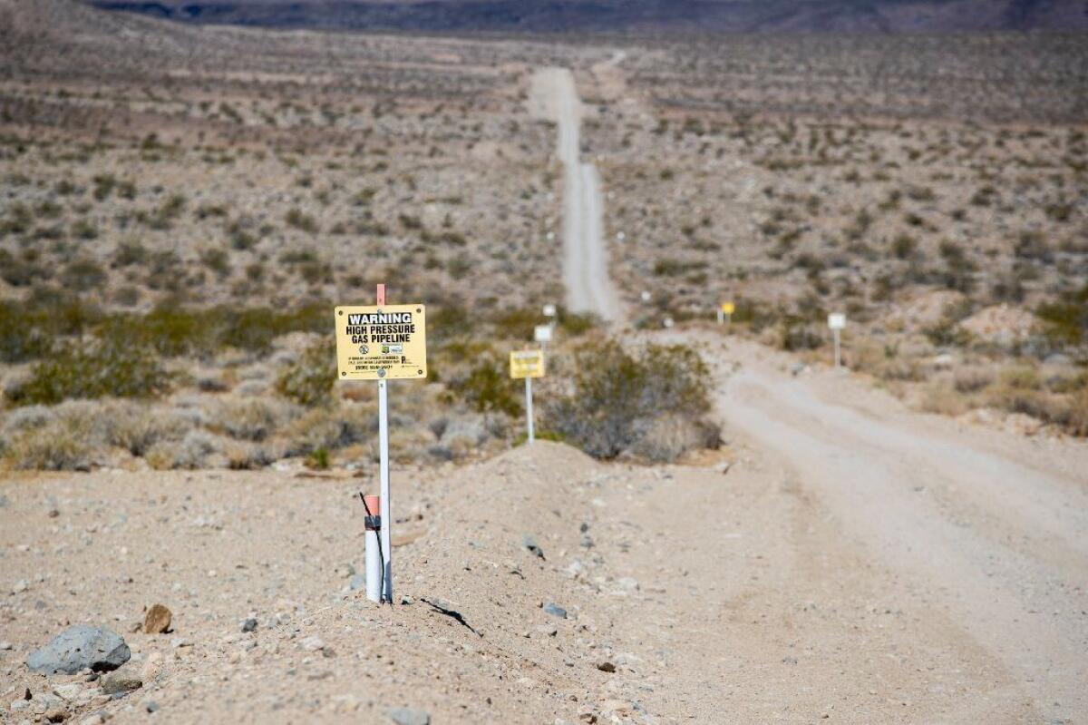 A dirt road runs alongside the route of Southern California Gas Co.'s Line 235, near Newberry Springs, Calif.